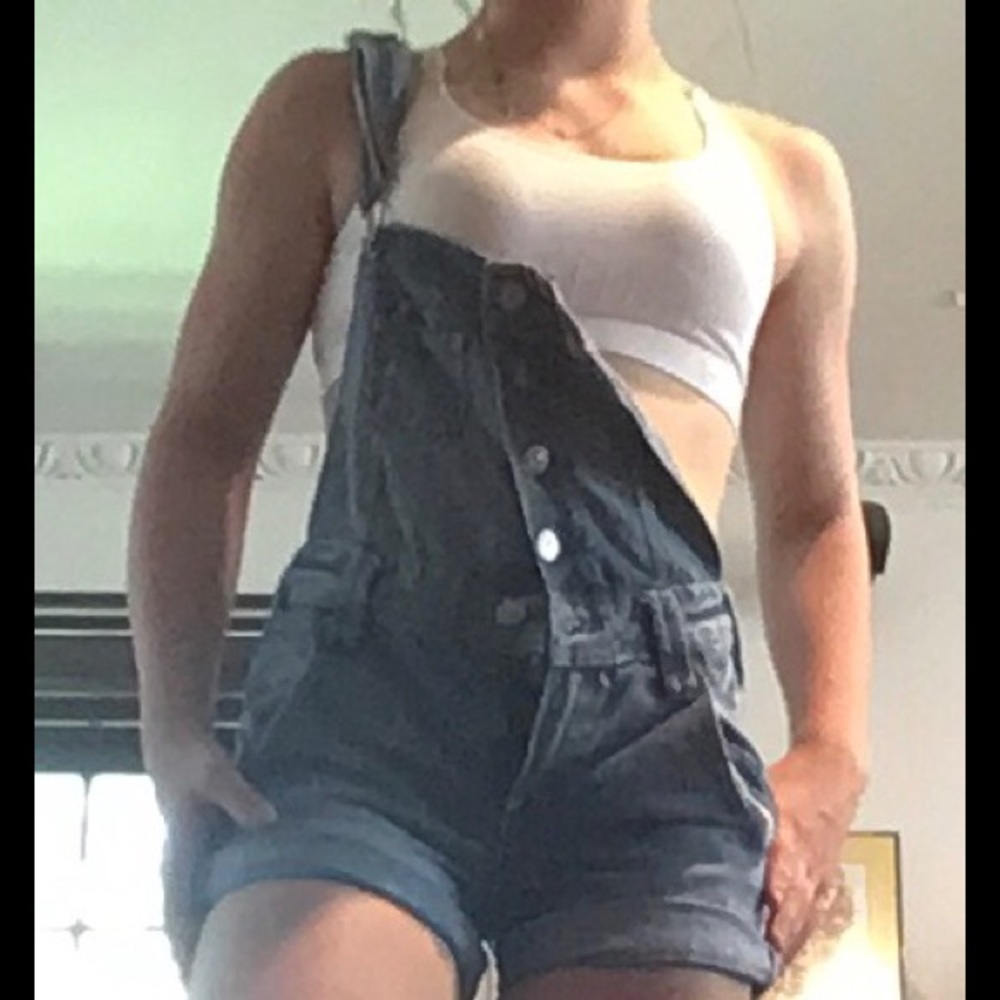 Dungaree light wash overalls.